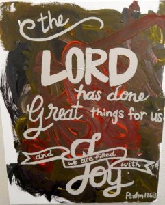 Jayden did the abstract painting. Gina wrote the scripture on it.